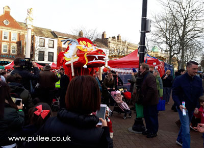 The giant dragon in the city centre parade